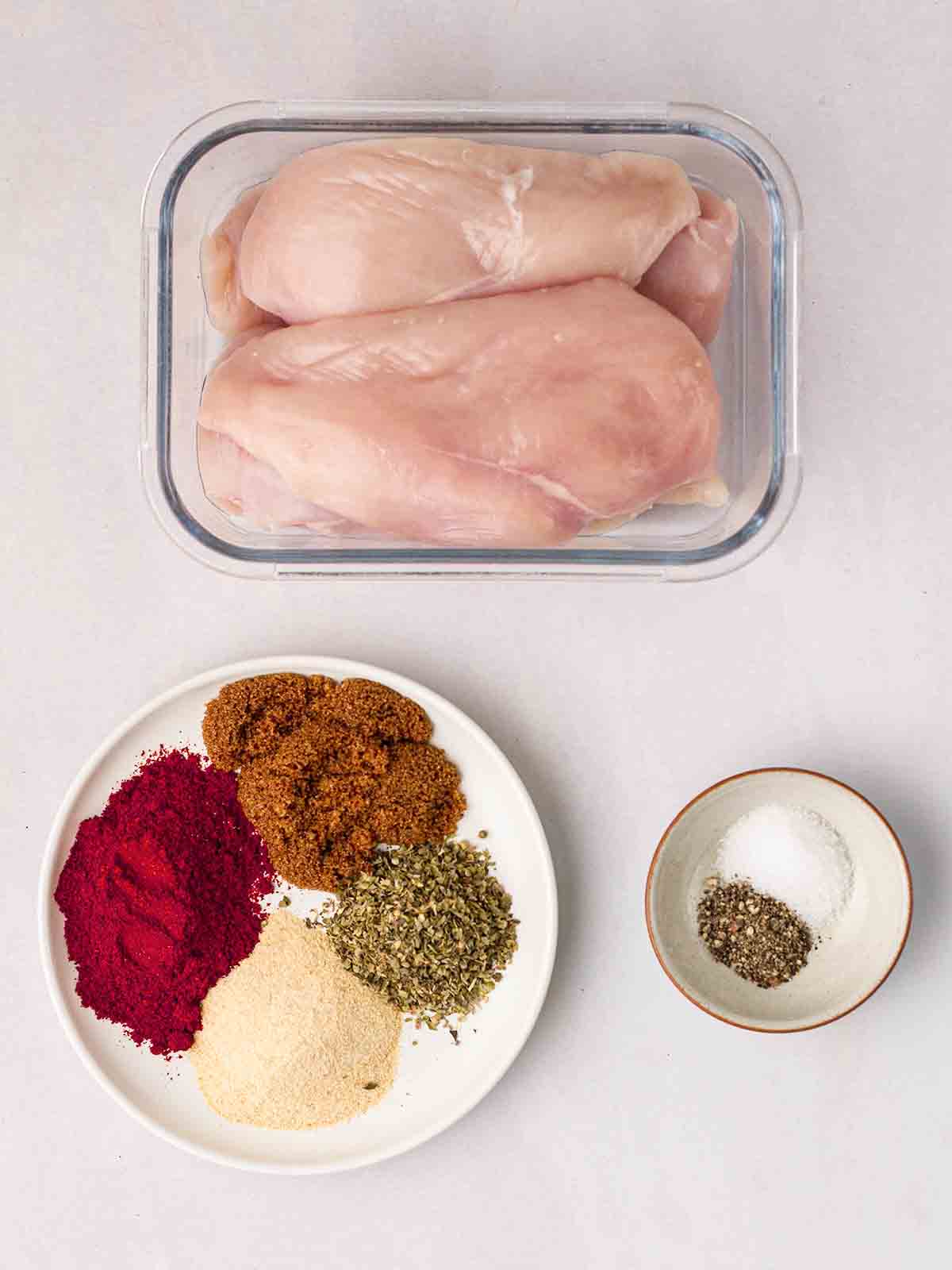 The ingredients for Air Fryer Chicken Breast recipe laid out on a counter top.